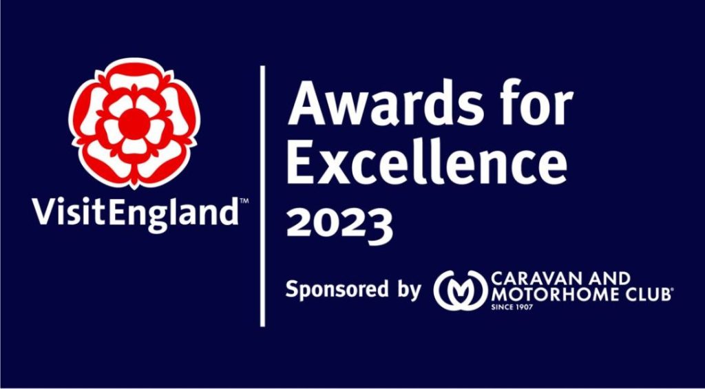 The red rose logo of Visit England, Awards for Excellence 2023 sponsored by Caravan and Motorhome Club.